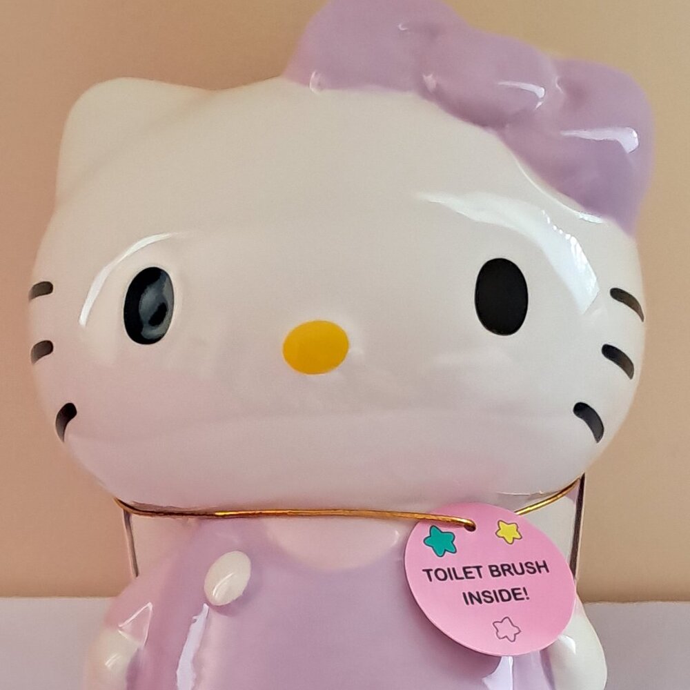 Hello kitty  ceramic white and purple toilet and  brush holder  set. Brand New